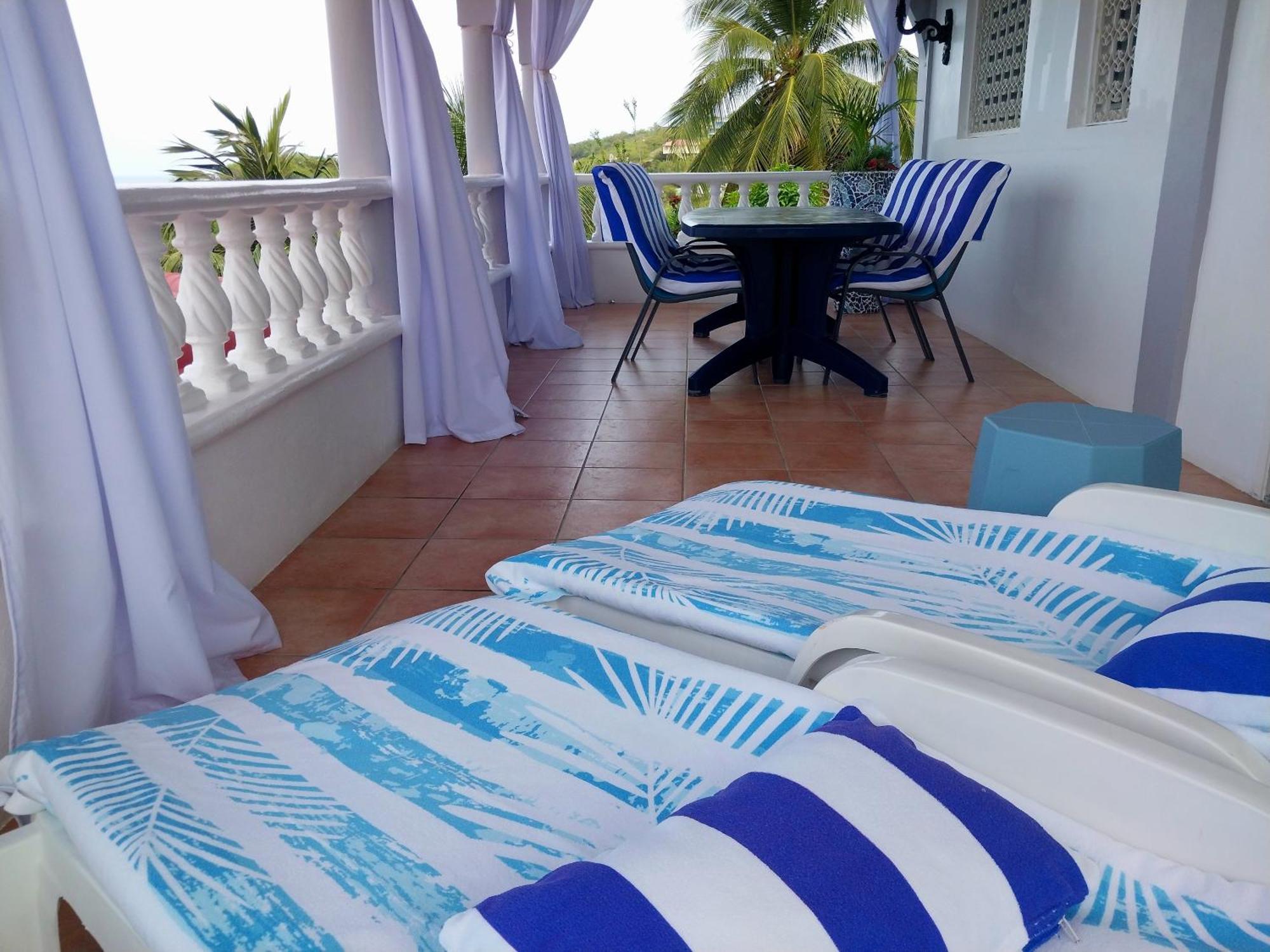 Caribbean Sea View Holiday Apartments Méro Екстериор снимка